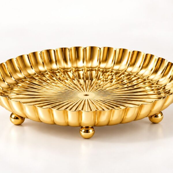 SHREEHOME SWARNA gold PVD footed platter with fluted rim and rounded feet, studio view